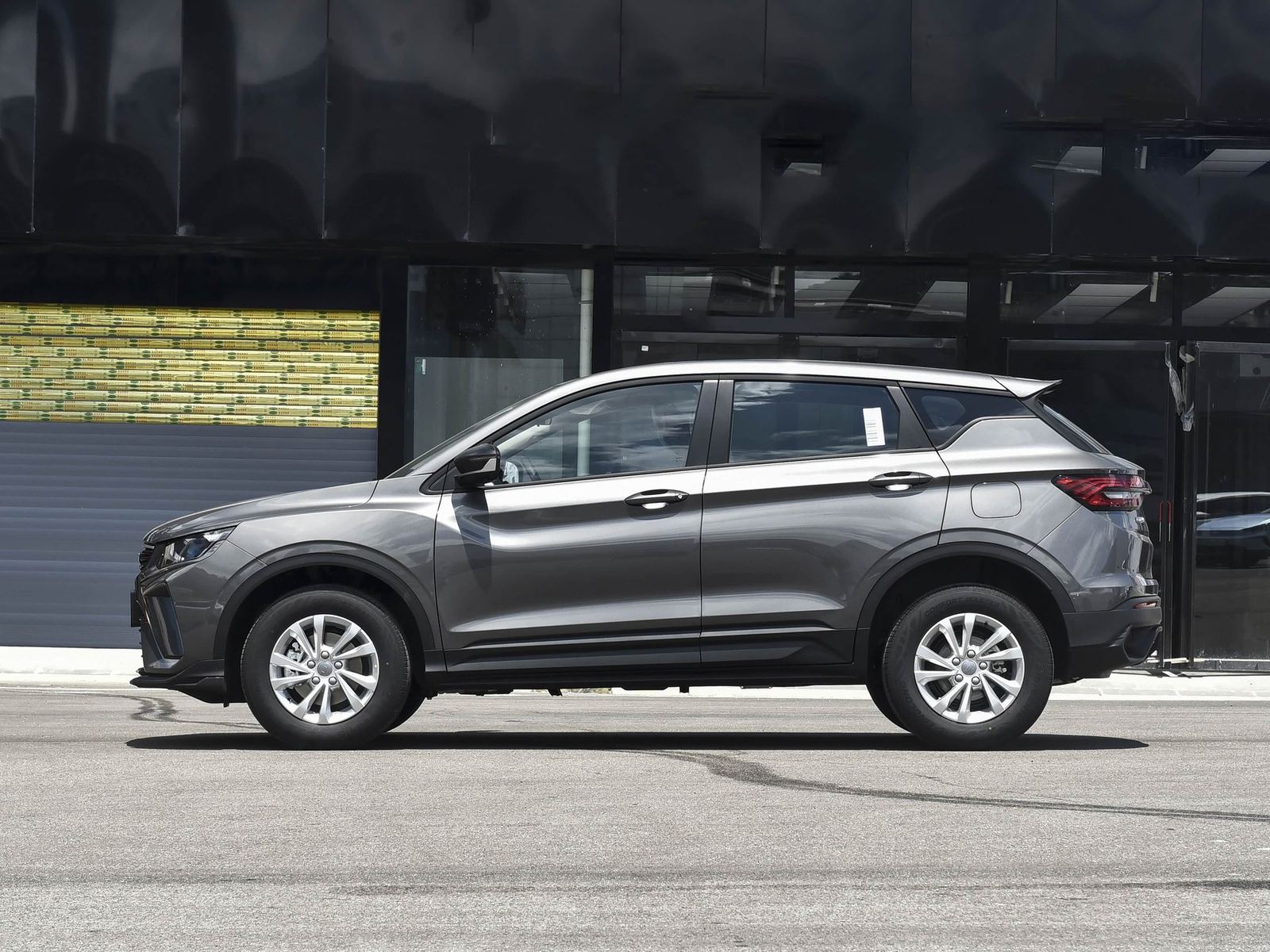 2025 Geely Binyue dark grey — side profile
